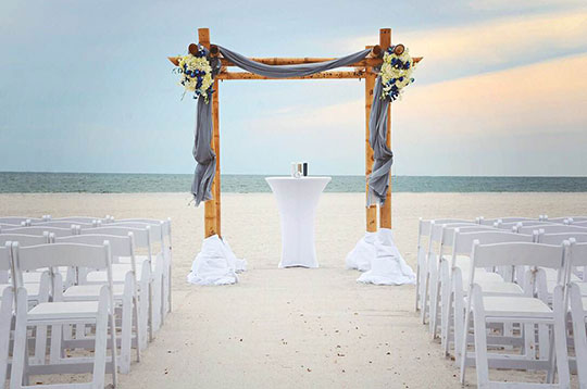 wedding arch on the beach at Sirata