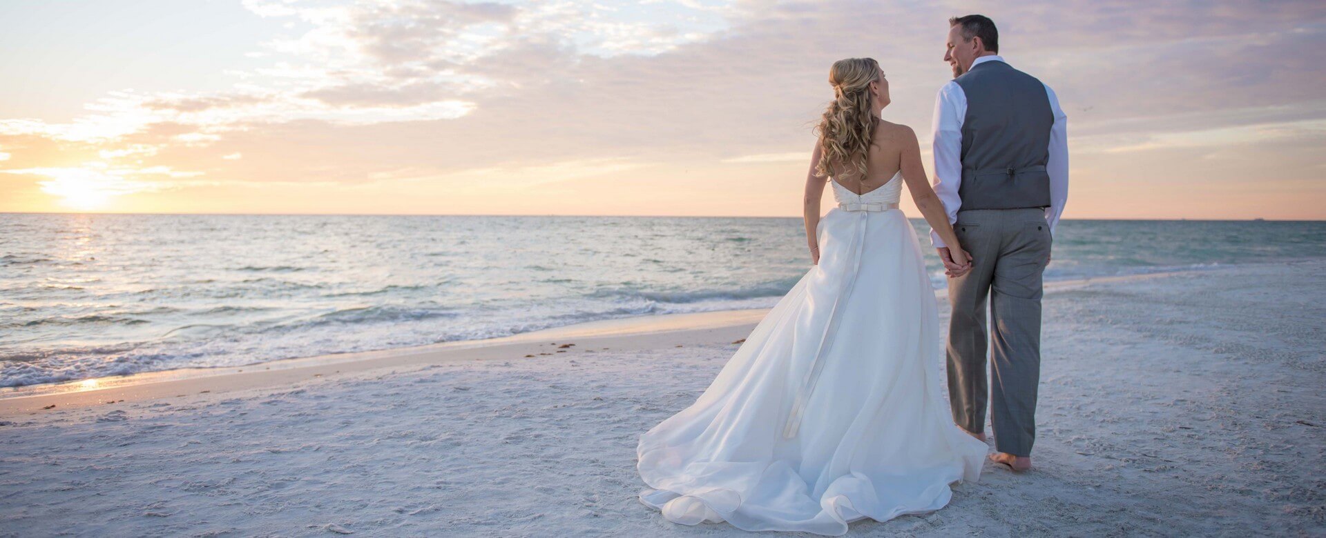 bride and groom on the beach