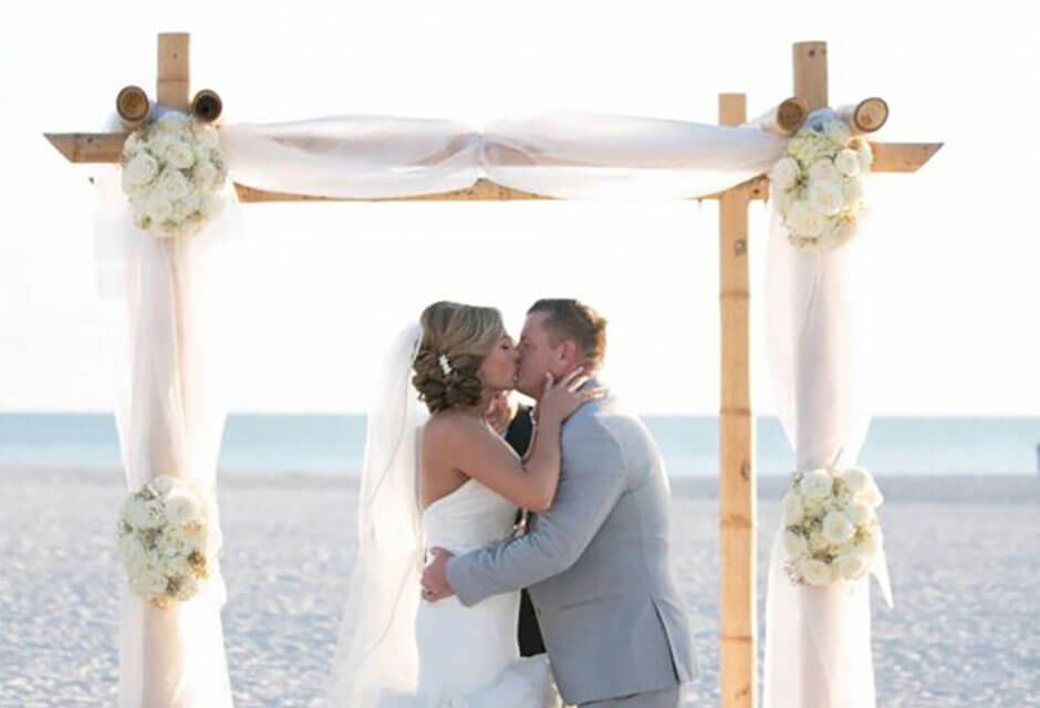 bride and groom at altar