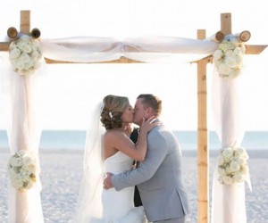 bride and groom at altar
