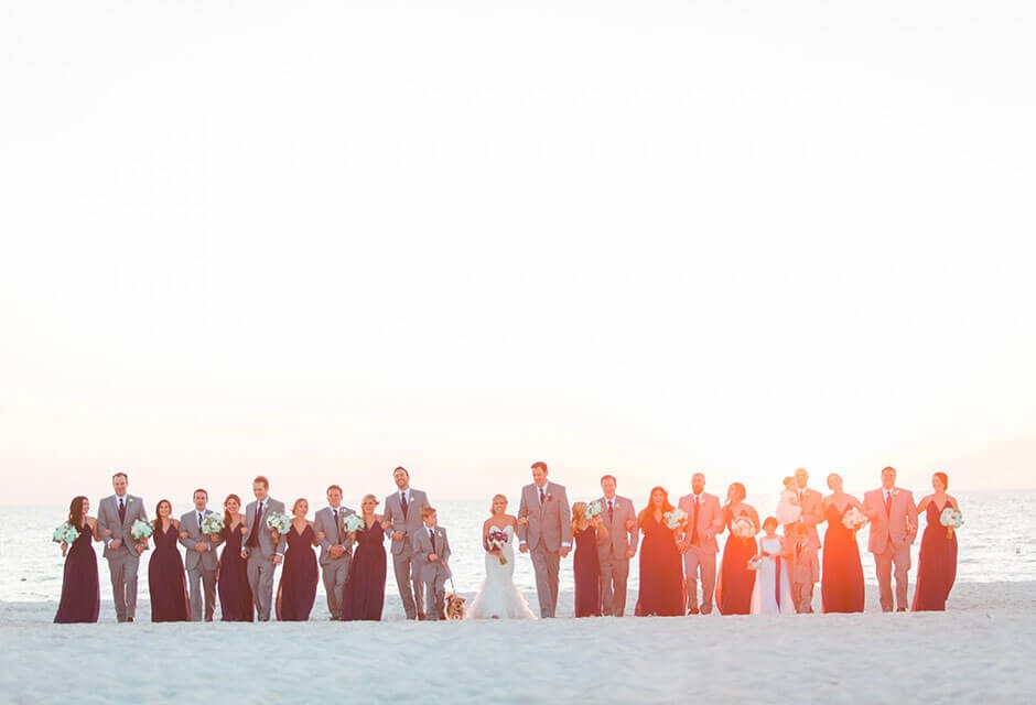bridal party on the beach