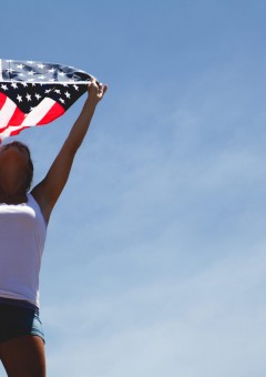 woman holding American flag